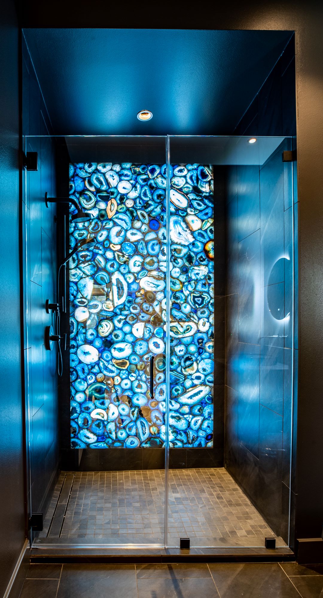 LED Backlit Agate stone slab shower LBJ Construction Houston Remodeling